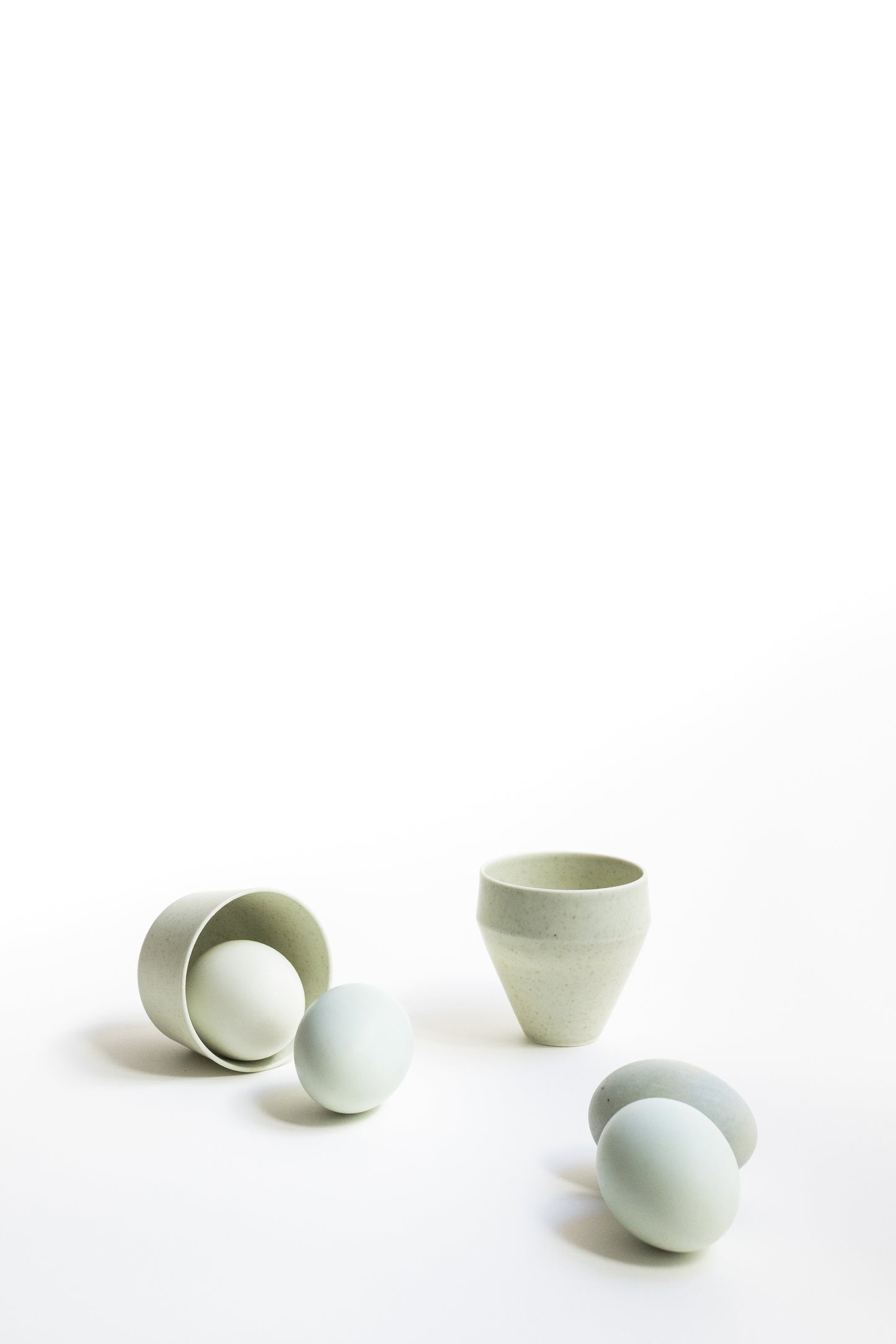 Set of ceramic cups on a white background