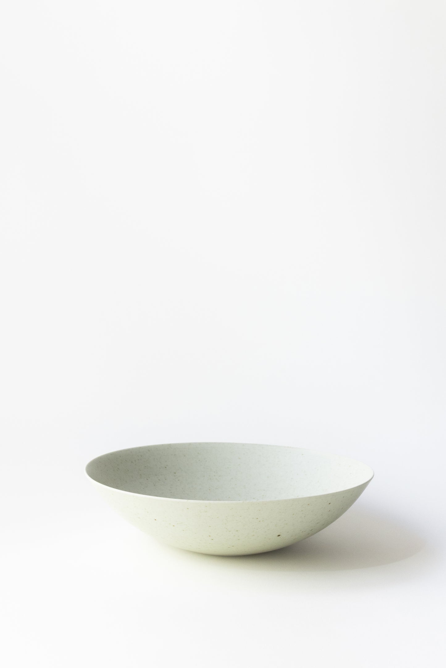 White ceramic bowl on a white background