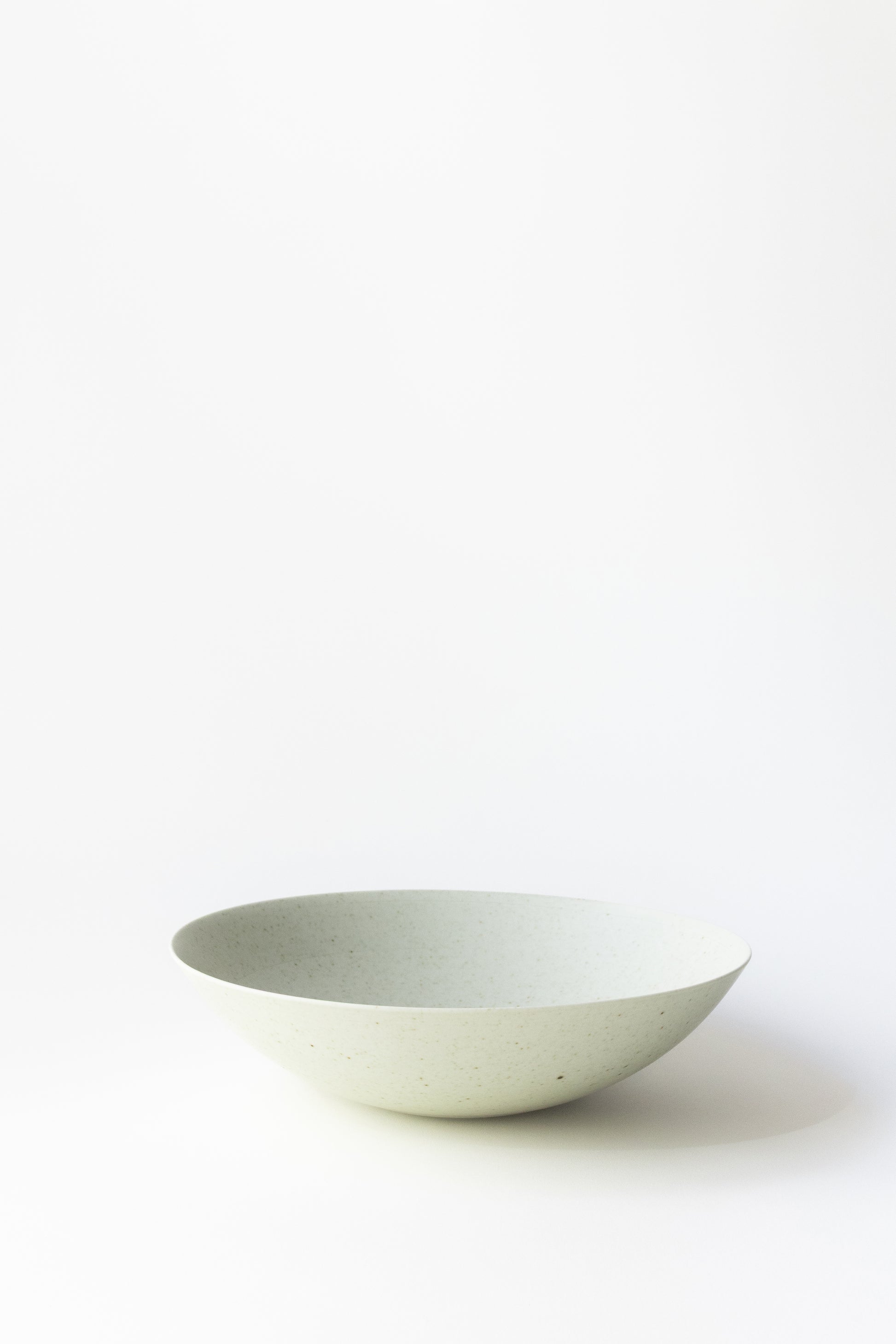 White ceramic bowl on a white background