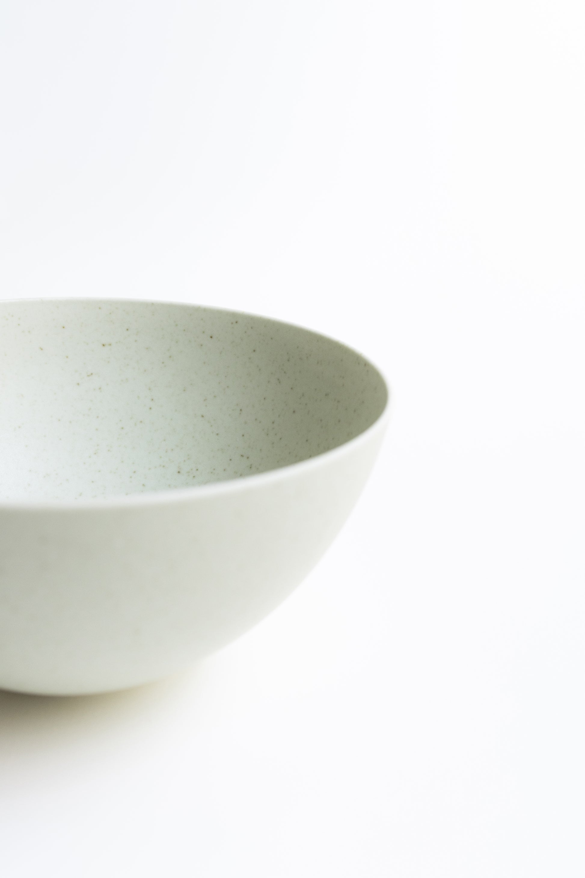 White ceramic bowl on a white background