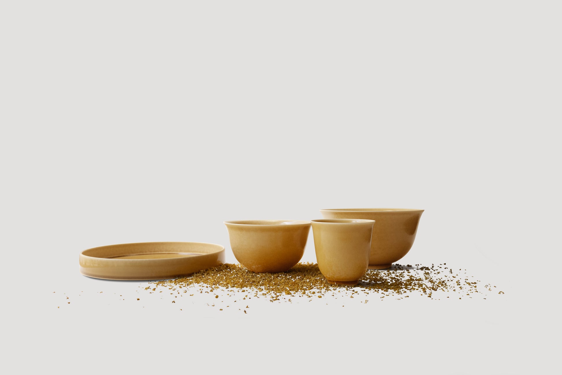 Set of four ceramic bowls on a light gray background