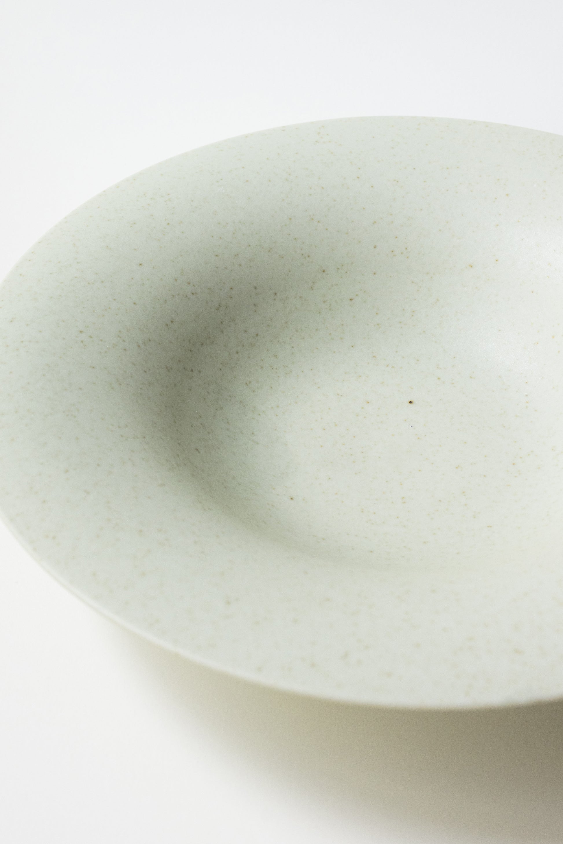 White ceramic bowl on a white background